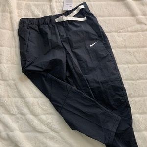 NIKE TECH-PACK Pants